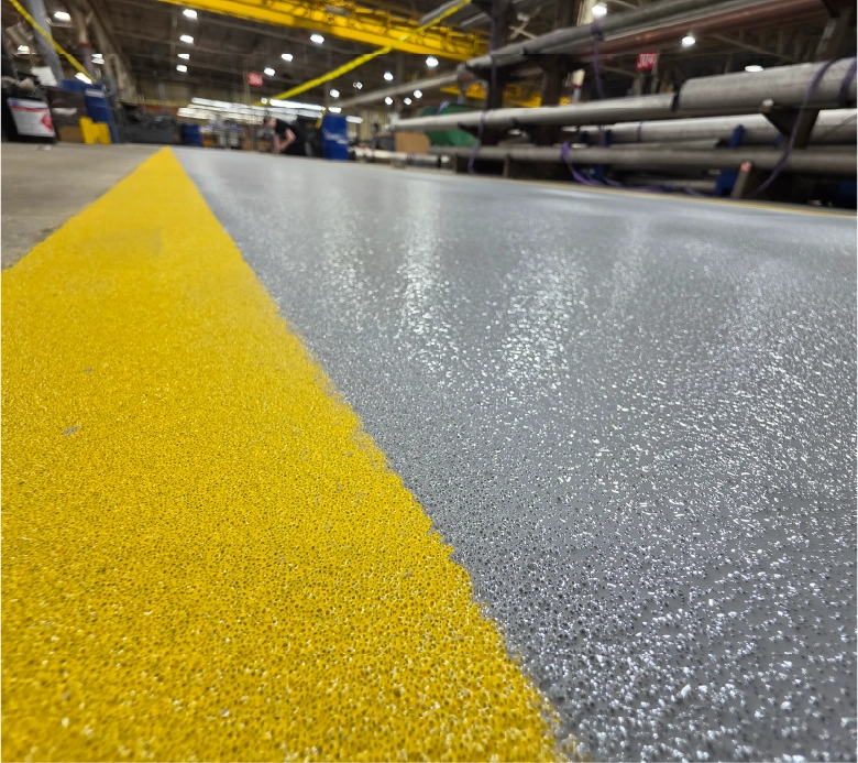 extured industrial epoxy flooring with safety striping